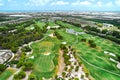 Aerial shot, drone point of view golf course during sunny summer day Royalty Free Stock Photo