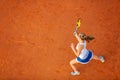 Aerial shot of a female tennis player on a court during match. Young woman playing tennis.High angle view. Royalty Free Stock Photo