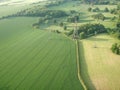 Aerial shot of fields with powerlines