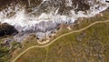 Aerial shot of foamy waves crashing the Goat Rock beach of Jenner in California, USA