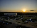 aerial shot of the Fredrick C. Hoboy Assembly Center on the campus of Grambling State University at sunset with a baseball field