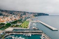 Aerial shot of the Funchal old town by the Atlantic ocean in the Madeira island, Portugal Royalty Free Stock Photo