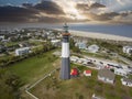 aerial shot of the a gorgeous spring landscape at Tybee Island Beach with the lighthouse, blue ocean water, a brown sandy beach Royalty Free Stock Photo