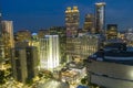 aerial shot of a gorgeous summer landscape with skyscrapers, hotels, office buildings in the city skyline at sunset