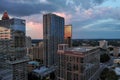 aerial shot of a gorgeous summer landscape with skyscrapers, hotels, office buildings and tower cranes in the city skyline