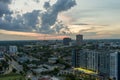 aerial shot of a gorgeous summer landscape with skyscrapers, hotels, office buildings and tower cranes in the city skyline