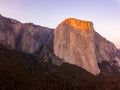 Aerial shot of Half Dome cliff at the Yosemite National Park in California at sunset Royalty Free Stock Photo