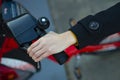 Aerial shot of a hand taking the handlebars of a bicycle Royalty Free Stock Photo