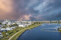 aerial shot of homes along the shores of Carolina Lake with hotels, retail stores and apartments in the city skyline Royalty Free Stock Photo