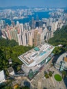 Aerial shot of Hong Kong cityscape with the Peak Tower. Royalty Free Stock Photo