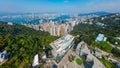 Aerial shot of Hong Kong cityscape with the Peak Tower. Royalty Free Stock Photo