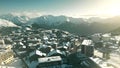 Aerial shot of hotels and chalets of Alpe d'Huez ski resort. Tourism in winter in France