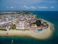 Aerial shot of the houses on the beach by the ocean captured in Zanzibar, Africa Royalty Free Stock Photo