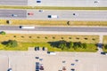 Aerial Shot of Industrial Loading Area where Many Trucks Are Unloading Merchandise