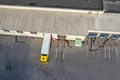 Aerial Shot of Industrial Warehouse Loading Dock where Many Truck