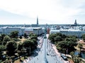 Aerial shot of Lattelecom marathon by the statue of liberty - Milda in Riga, Latvia