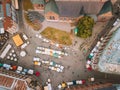 Aerial shot of Latvian Radio building with a summer festival in Riga Dome Cathedral Square