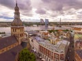 Aerial shot of Latvian Radio building with a summer festival in Riga Dome Cathedral Square