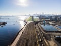 Aerial shot of a line of cargo train cars in the North Vancouver trainyard. Royalty Free Stock Photo