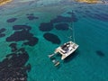 Luxury sailing catamaran moored in a calm bay