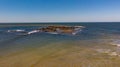 Aerial shot of a mesmerizing seascape in the daytime under the clear sky