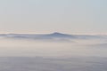 Aerial shot of the misty Black Mountains in Wales