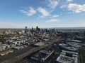 Aerial shot of the modern cityscape of Denver under the blue cloudy sky in Colorado, USA Royalty Free Stock Photo