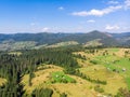 Aerial shot Mountain hill valley landscape from a drone. Mountain village view from above Royalty Free Stock Photo