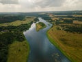 Aerial shot of Neris River in Kernave, Lithuania under a cloudy sky Royalty Free Stock Photo