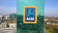 Aerial shot of office skyscraper with Aldi logo. Modern office building. Editorial 3D rendering