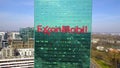 Aerial shot of office skyscraper with ExxonMobil logo. Modern office building. Editorial 3D rendering