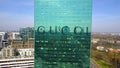 Aerial shot of office skyscraper with Gucci logo. Modern office building. Editorial 3D rendering