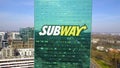 Aerial shot of office skyscraper with Subway logo. Modern office building. Editorial 3D rendering