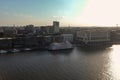 Aerial shot of the restaurants, hotels and office buildings along the riverfront of the Savannah River with ships Royalty Free Stock Photo