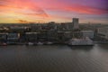 Aerial shot of the restaurants, hotels and office buildings along the riverfront of the Savannah River with ships and yachts Royalty Free Stock Photo