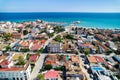 Aerial shot rooftops houses and Mediterranean Sea view