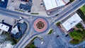 Aerial shot of a roundabout surrounded by buildings in Eden, NC, the USA