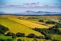 Aerial shot of rural farmland with hills of green and yellow foliage in Brecon Beacons, Wales, UK Royalty Free Stock Photo