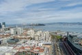 aerial shot of the San Francisco Oakland Bay Bridge, Oracle Park and office buildings and skyscrapers in the city skyline