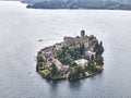 Aerial shot of the San Giulio Island on lake Orta in northern Italy Royalty Free Stock Photo