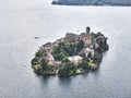 Aerial shot of the San Giulio Island on lake Orta in northern Italy Royalty Free Stock Photo