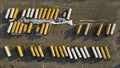 Aerial shot of school busses parked in a lot.