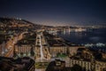 Aerial shot of the sea with Naples night panorama in Italy Royalty Free Stock Photo