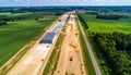 Aerial view of construction site with building and road works Royalty Free Stock Photo