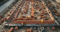 Aerial View of Construction Site: Bricklayers Building a Wall, Teamwork in Progress Royalty Free Stock Photo