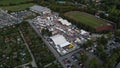 Aerial shot of the Sinnflut Festival with lots of parked cars and people gathered in Erding, Germany