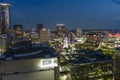 aerial shot of skyscrapers, hotels, office buildings in the city skyline at sunset with the SkyView Atlanta Ferris wheel