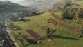 Aerial Shot Of A Small Village And A Road In The Carpathian Mountains In Autu