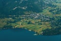 Aerial shot of Stara Fuzina, beautiful scenic alpine village in Lake Bohinj Valley in Slovenia Royalty Free Stock Photo