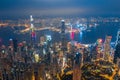 Aerial shot a Thousand of skyscraper on two side of Victoria Harbour of Hong Kong. View from the Peak at night. Royalty Free Stock Photo